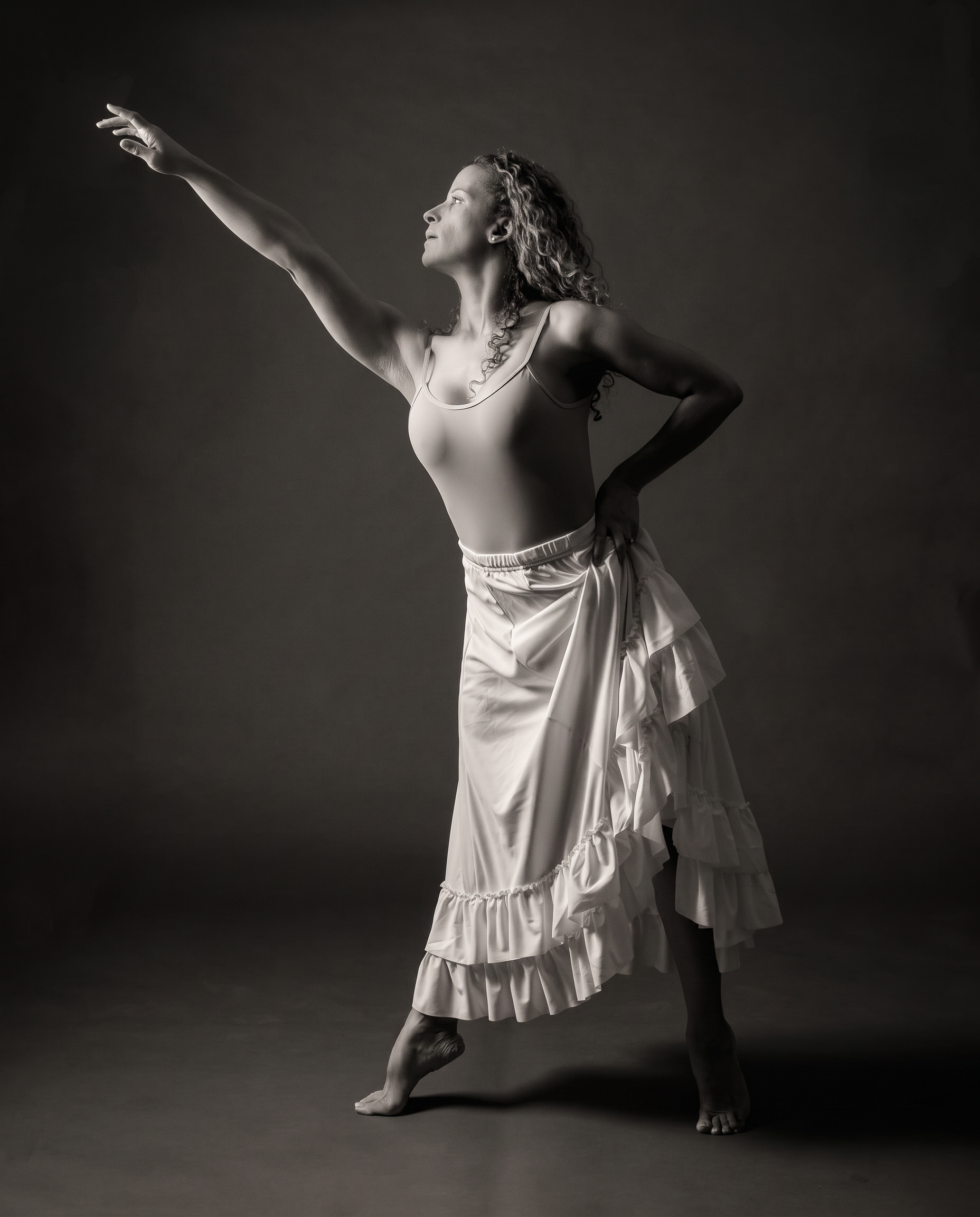 Glenda Miller expressing graceful movement in a black-and-white portrait